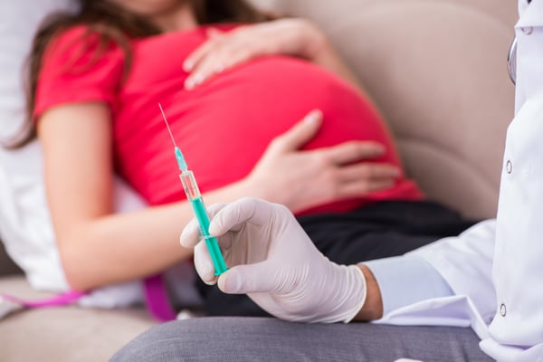 Pregnant woman getting Tdap vaccine