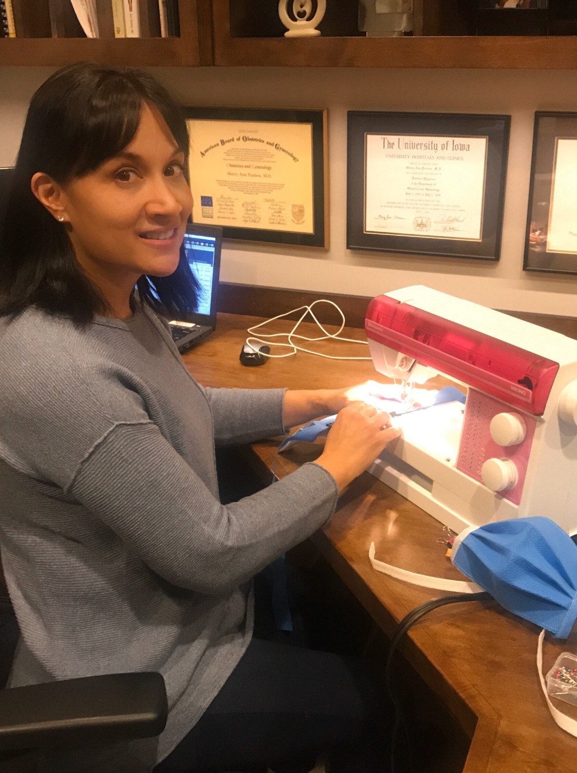 Sewing protective masks for healthcare providers.